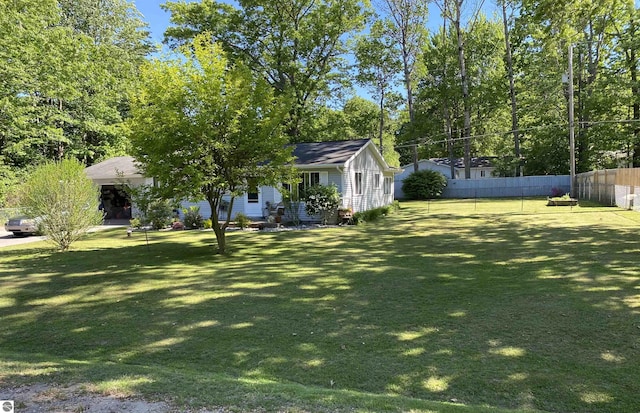 view of yard with fence