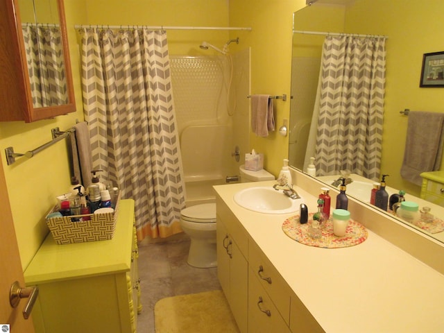 bathroom with shower / bath combination with curtain, vanity, and toilet