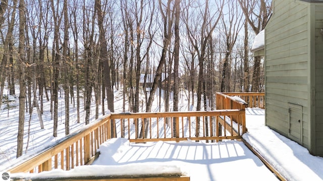 view of snow covered deck