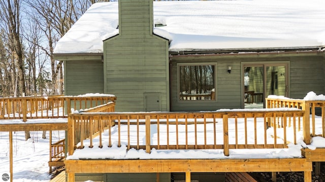 view of snow covered deck