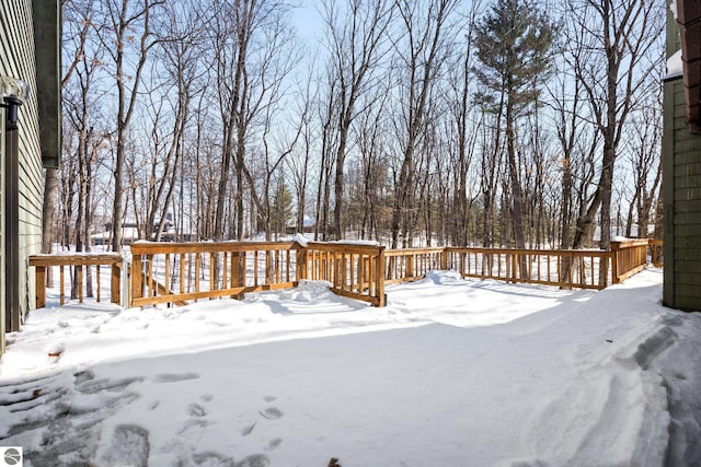 view of snow covered deck