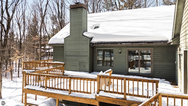 view of snow covered deck