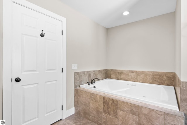 full bathroom featuring a garden tub