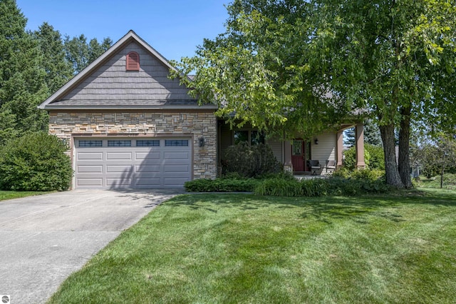 view of front of house with a porch, concrete driveway, a garage, stone siding, and a front lawn