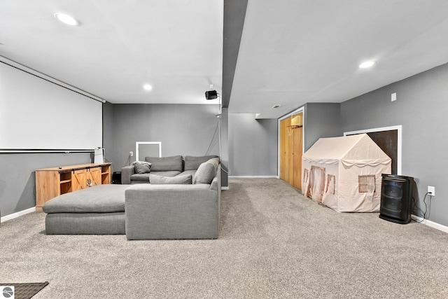 carpeted home theater featuring recessed lighting and baseboards