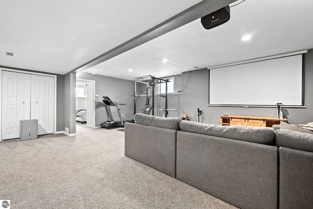 cinema with carpet and baseboards