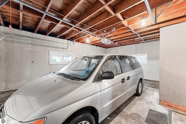 garage featuring a garage door opener