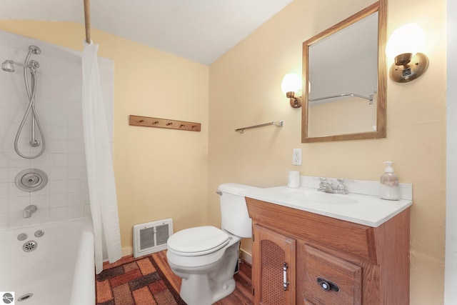 bathroom featuring toilet, shower / tub combo, wood finished floors, vanity, and visible vents