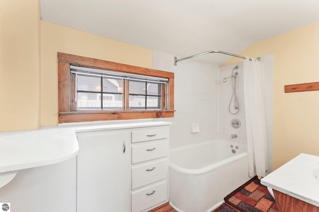 bathroom with shower / bath combination with curtain