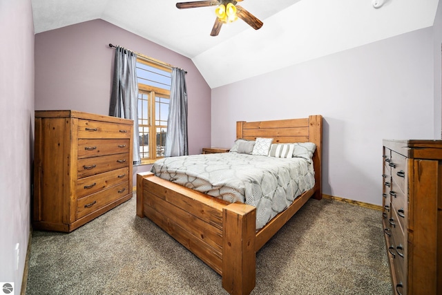 bedroom featuring ceiling fan, baseboards, dark carpet, and vaulted ceiling