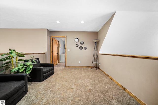 sitting room featuring carpet floors, recessed lighting, and baseboards