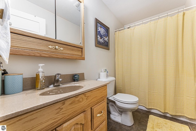 bathroom with vanity, tile patterned flooring, toilet, and a shower with curtain