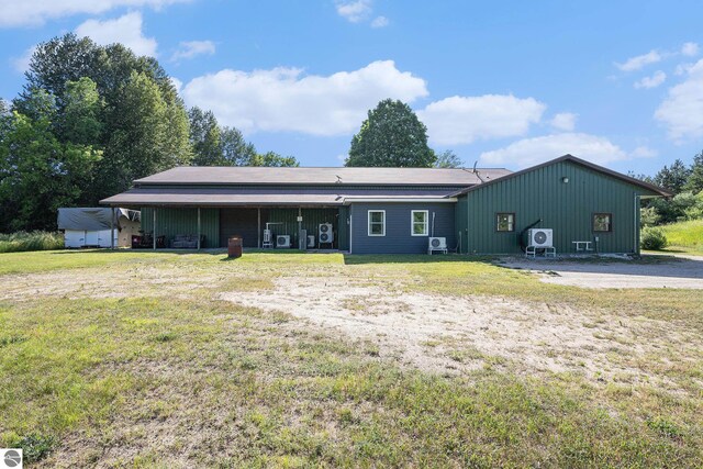 ranch-style home with a front lawn