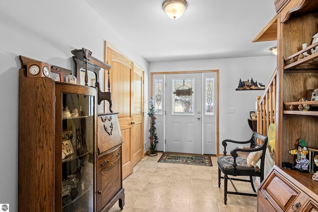 foyer entrance featuring stairway