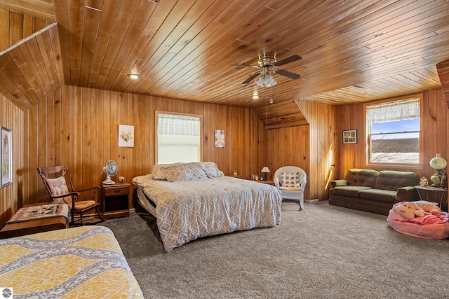 bedroom featuring vaulted ceiling, carpet floors, and wooden ceiling