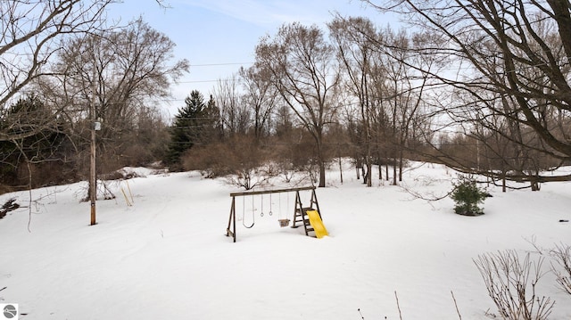 view of yard covered in snow