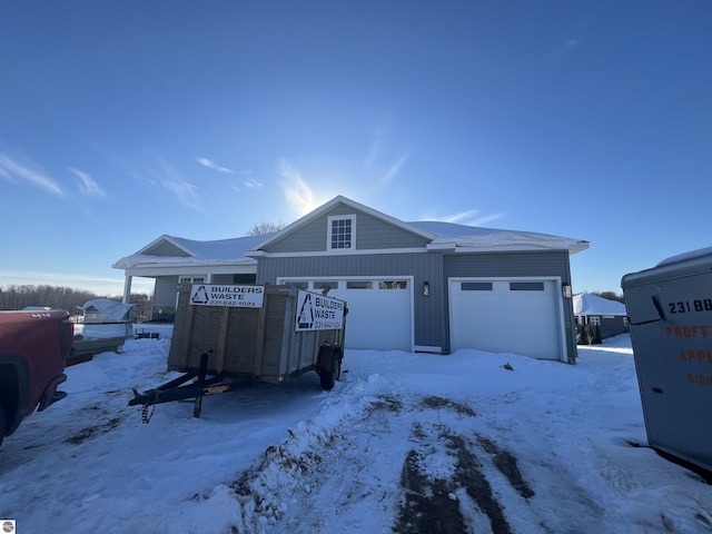 view of front of property featuring board and batten siding and an attached garage