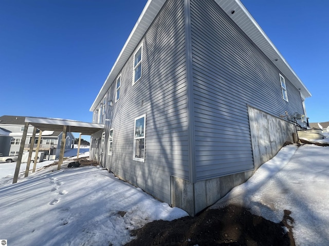 view of snow covered property