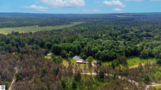 aerial view featuring a forest view