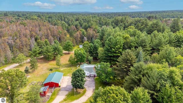 bird's eye view featuring a view of trees