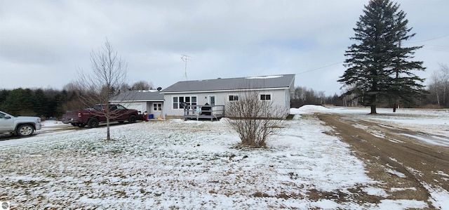 view of front of property with a deck