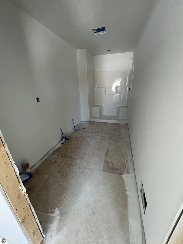 bathroom with walk in shower and visible vents