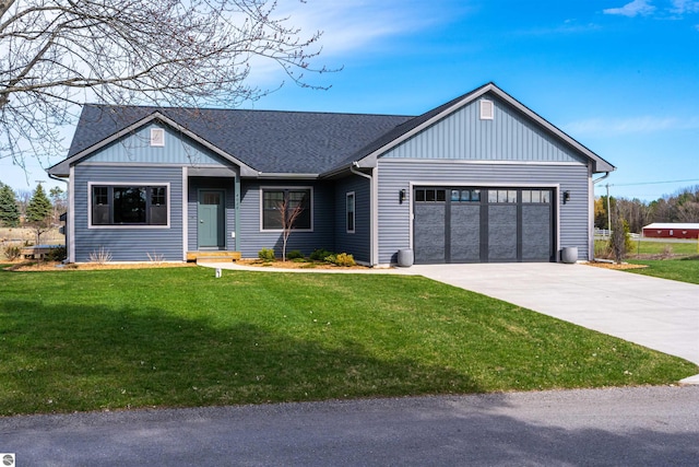 view of front of house with a garage, a shingled roof, concrete driveway, a front lawn, and board and batten siding