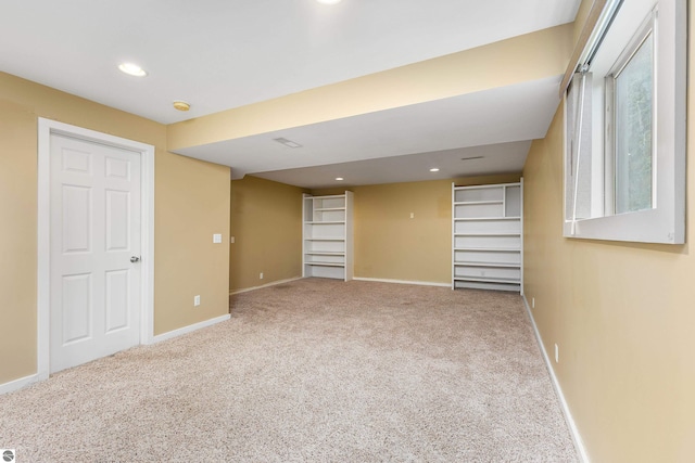 basement featuring recessed lighting, carpet, and baseboards