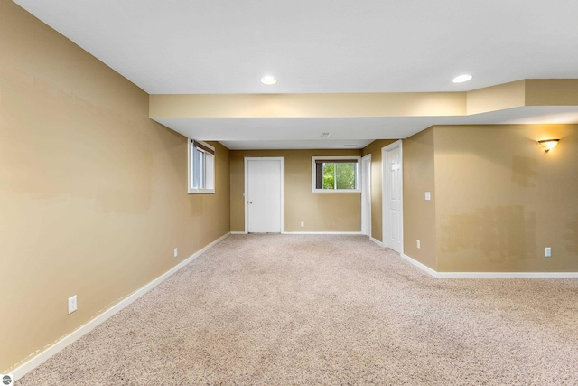 basement with carpet, baseboards, and recessed lighting