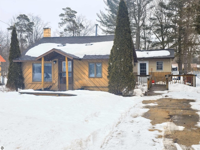 chalet / cabin with a chimney