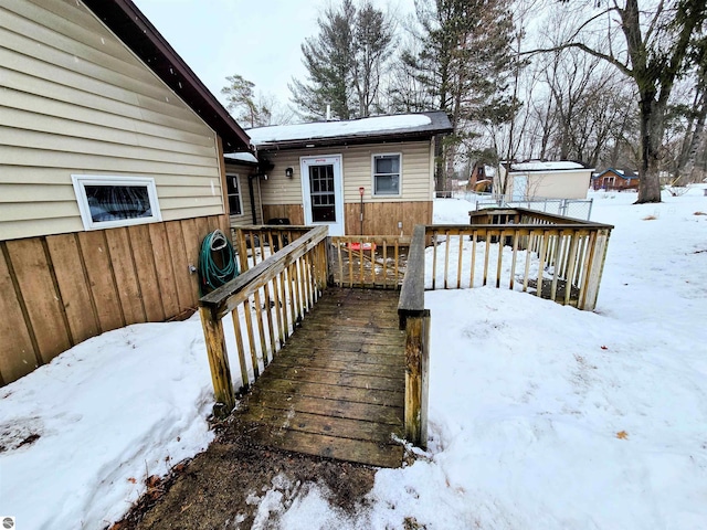 view of snow covered deck