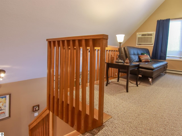 interior space with carpet, vaulted ceiling, and a wall unit AC