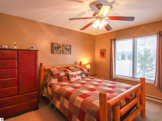 bedroom with a ceiling fan and light colored carpet