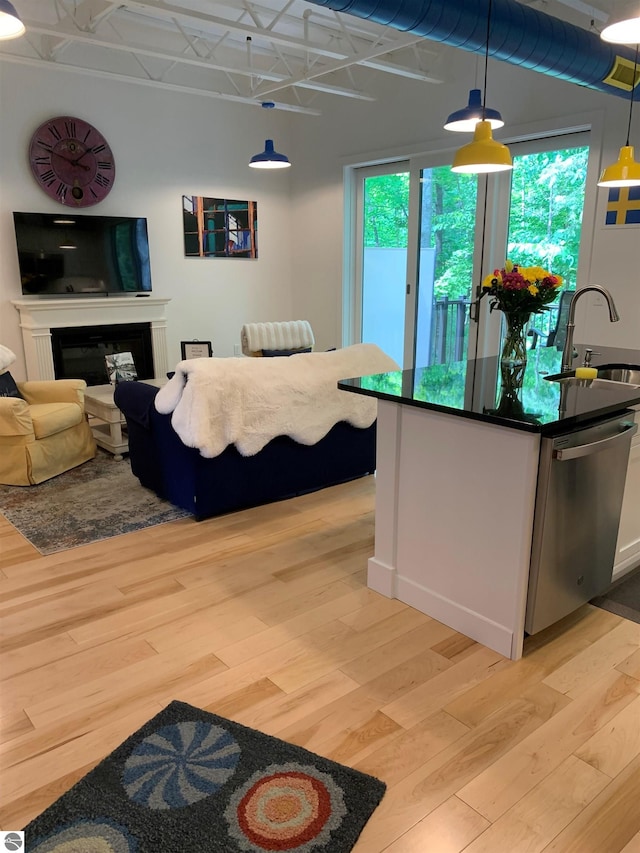 interior space with a fireplace and a sink