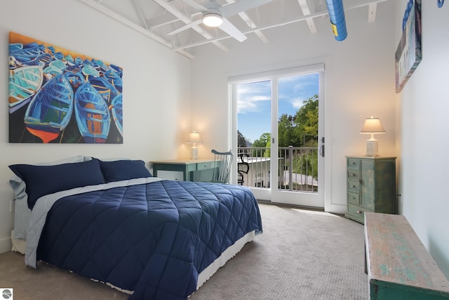 bedroom featuring access to outside and carpet floors