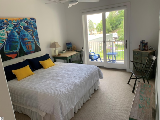 bedroom featuring light carpet, access to exterior, and multiple windows