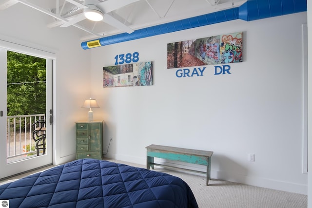 bedroom featuring carpet floors, access to outside, multiple windows, and baseboards