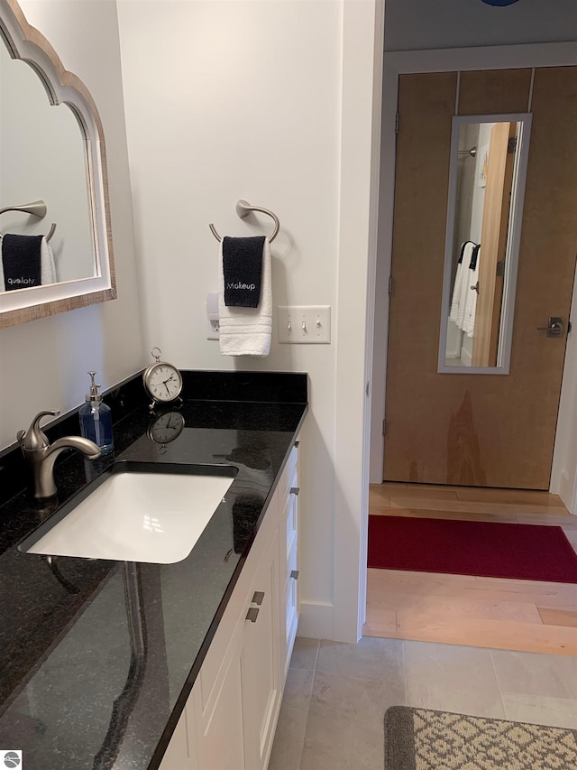 bathroom featuring vanity and tile patterned floors