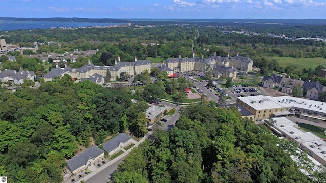 aerial view featuring a wooded view