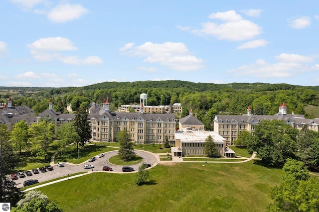 bird's eye view featuring a view of trees