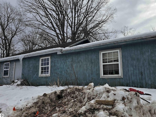 view of snow covered property