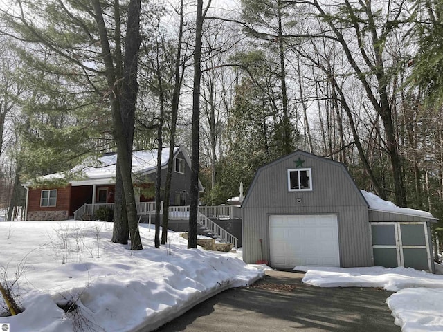 exterior space featuring a detached garage