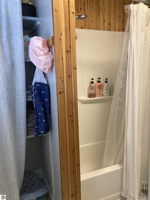 bathroom featuring shower / bath combination with curtain