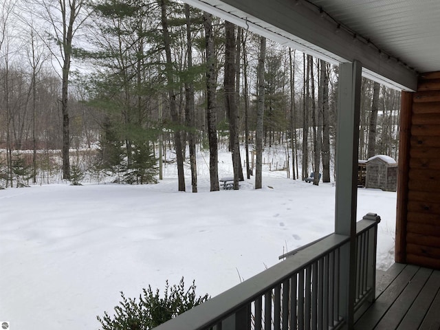 view of yard layered in snow