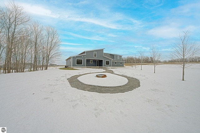 view of snow covered house