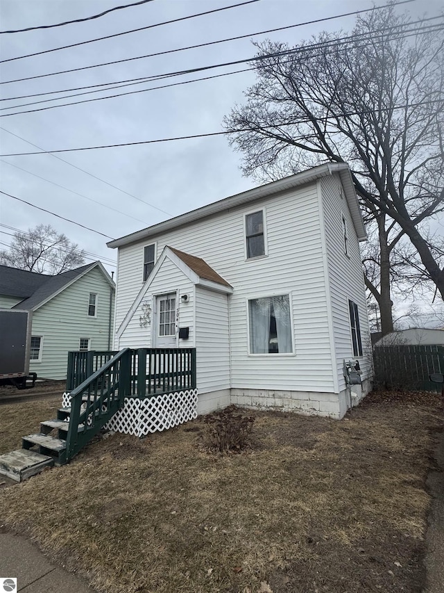 view of front of property featuring a deck