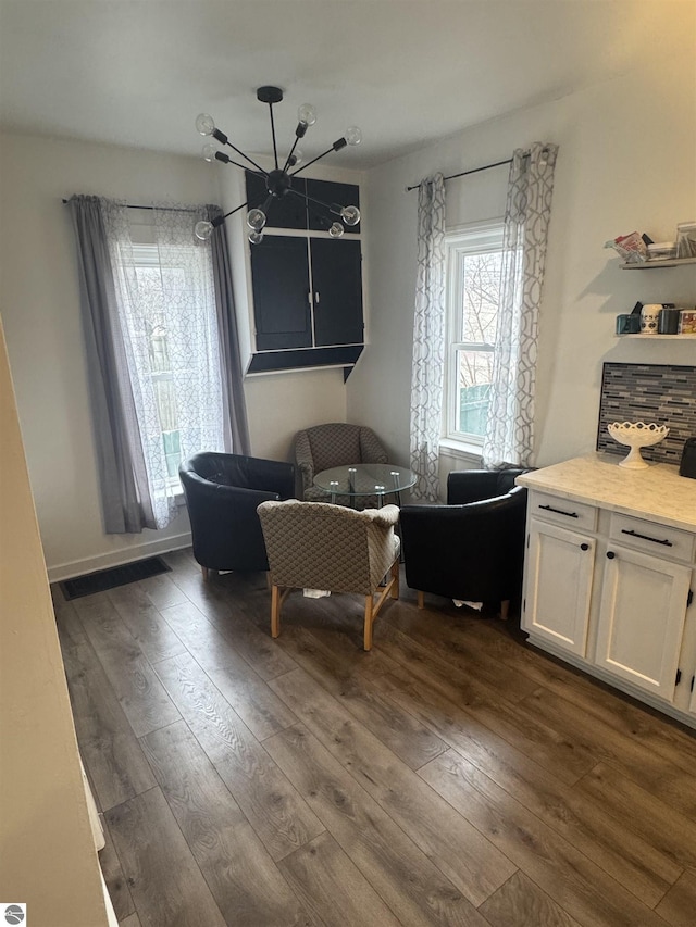 dining room with dark wood finished floors