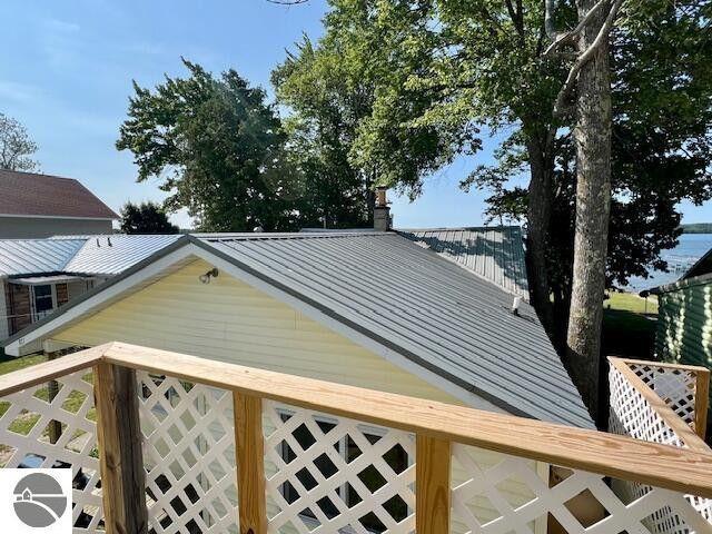 view of property exterior with metal roof