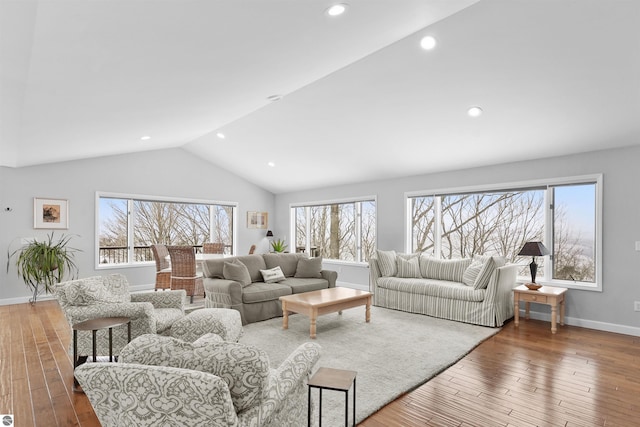 living room with wood-type flooring, baseboards, vaulted ceiling, and recessed lighting