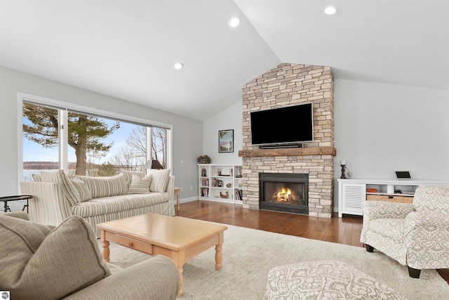 living room with a fireplace, recessed lighting, vaulted ceiling, wood finished floors, and baseboards